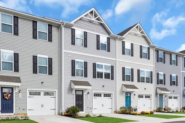 a view of building with yard