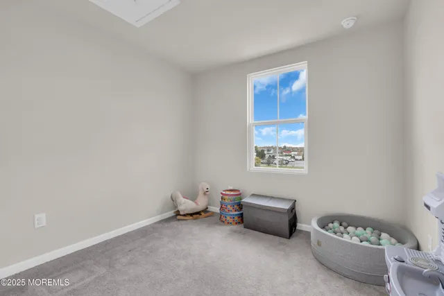 a room with furniture and window