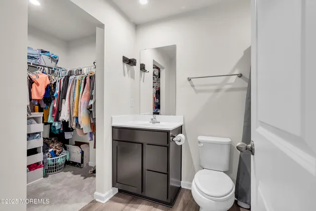 a bathroom with a toilet sink and tub