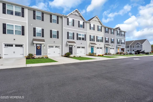 a view of building with large windows