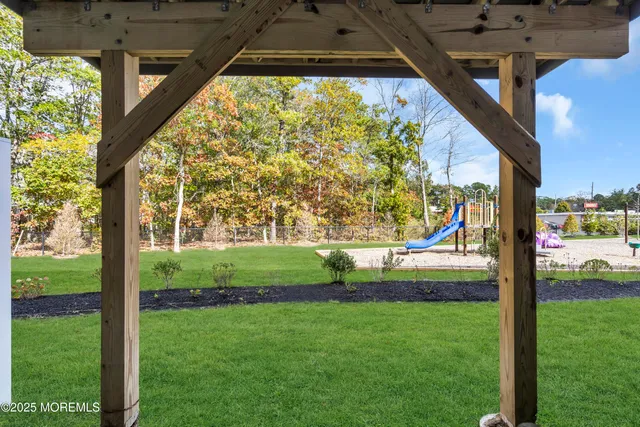 a view of back yard from a porch