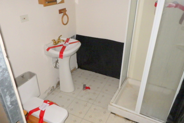 524 East 90th Street Chicago, IL 60619 - Photo 11 of 15 a bathroom with a sink toilet and vanity