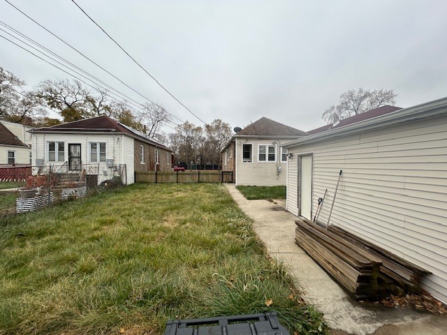 524 East 90th Street Chicago, IL 60619 - Photo 15 of 15 a view of a house with backyard and garden
