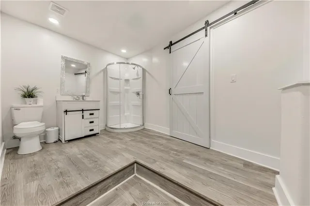 a view of a bathroom with a sink and a toilet