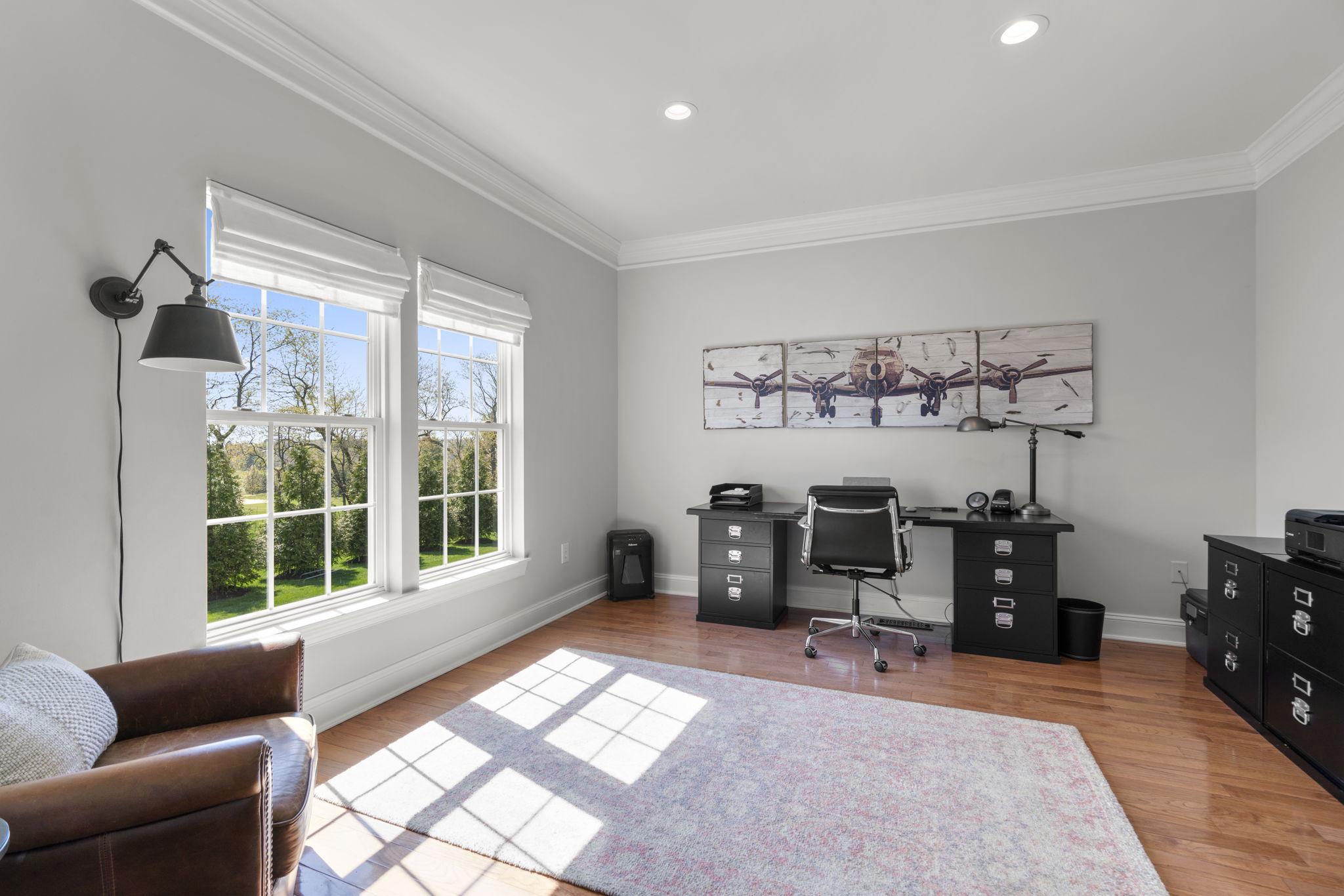 3088 Ballesteras Court Mount Airy, MD 21771 - Photo 22 of 64 a living room with furniture a window and gym equipment