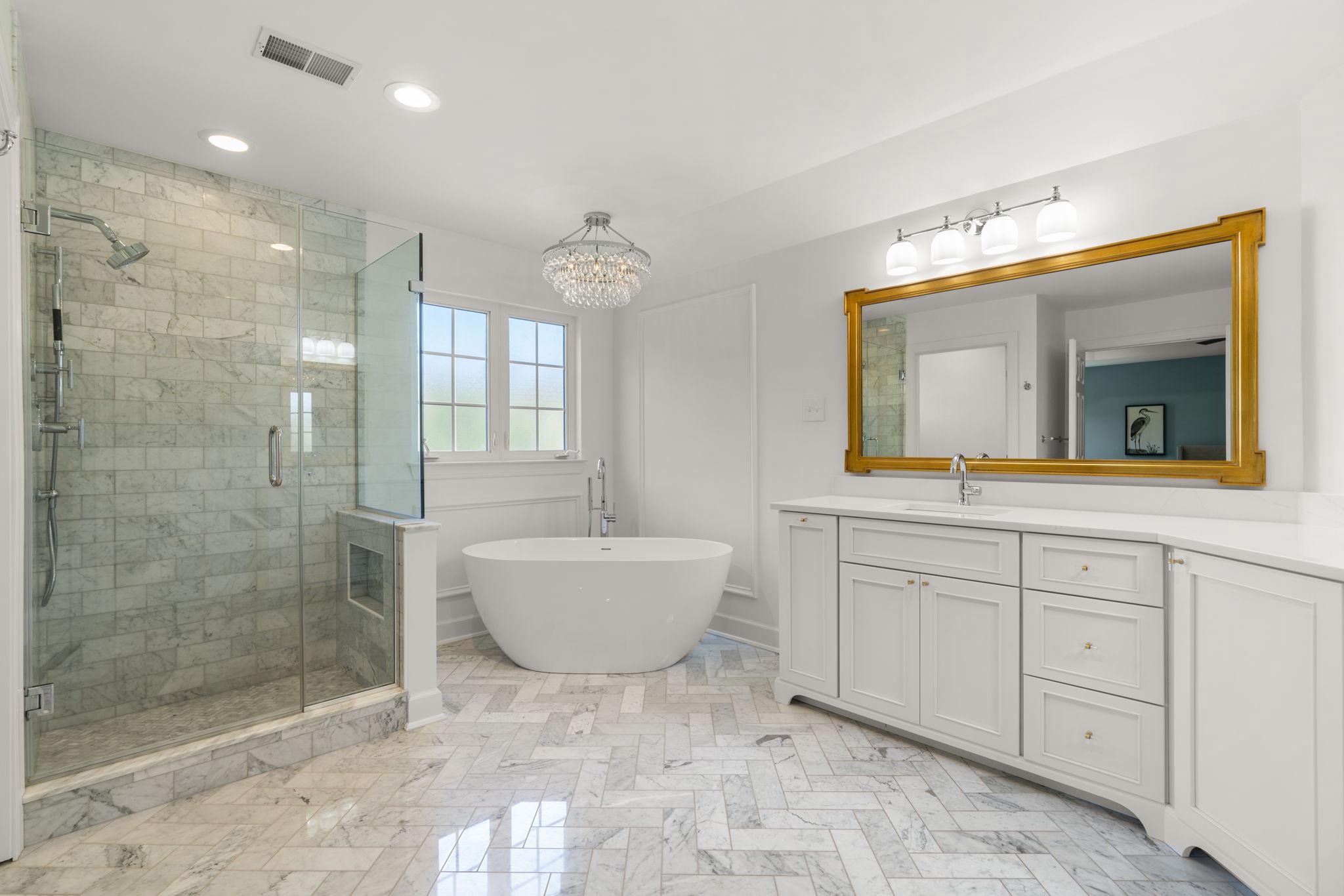 3088 Ballesteras Court Mount Airy, MD 21771 - Photo 29 of 64 a spacious bathroom with a bathtub shower sink mirror and toilet