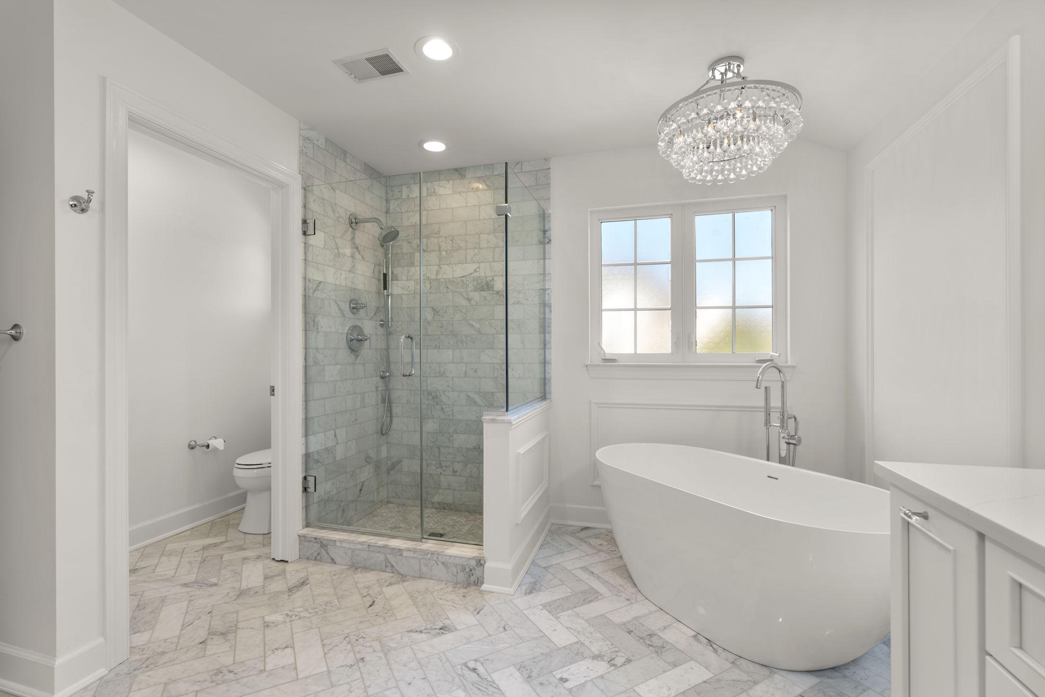 3088 Ballesteras Court Mount Airy, MD 21771 - Photo 30 of 64 a bathroom with a bathtub and a shower