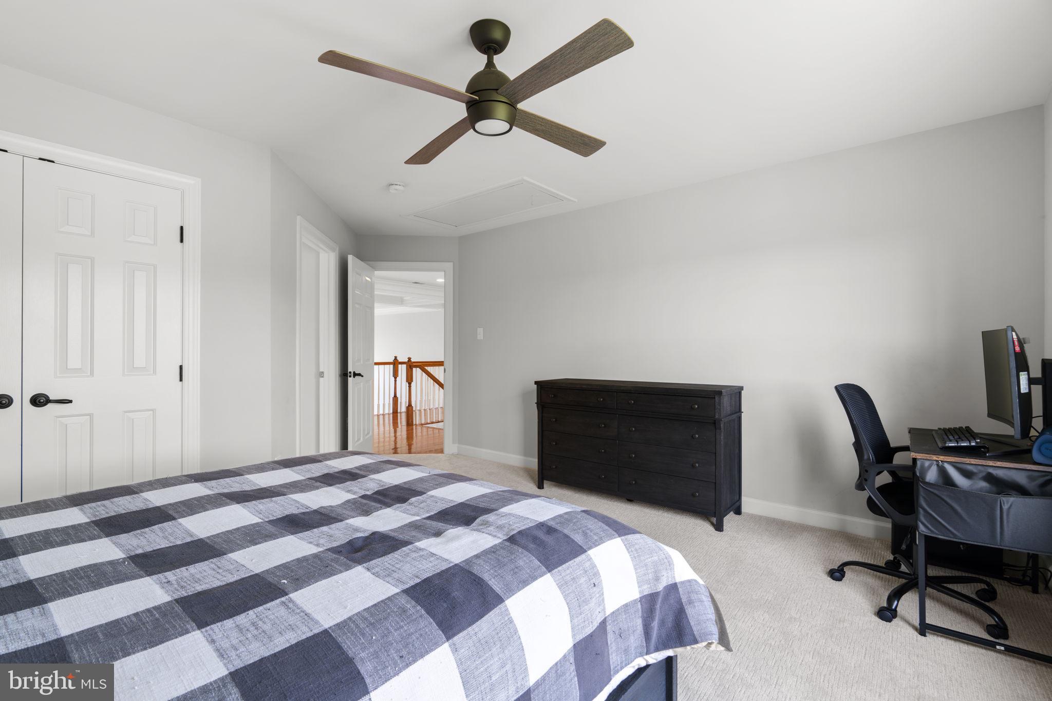 3088 Ballesteras Court Mount Airy, MD 21771 - Photo 36 of 64 a bedroom with a bed and a chair