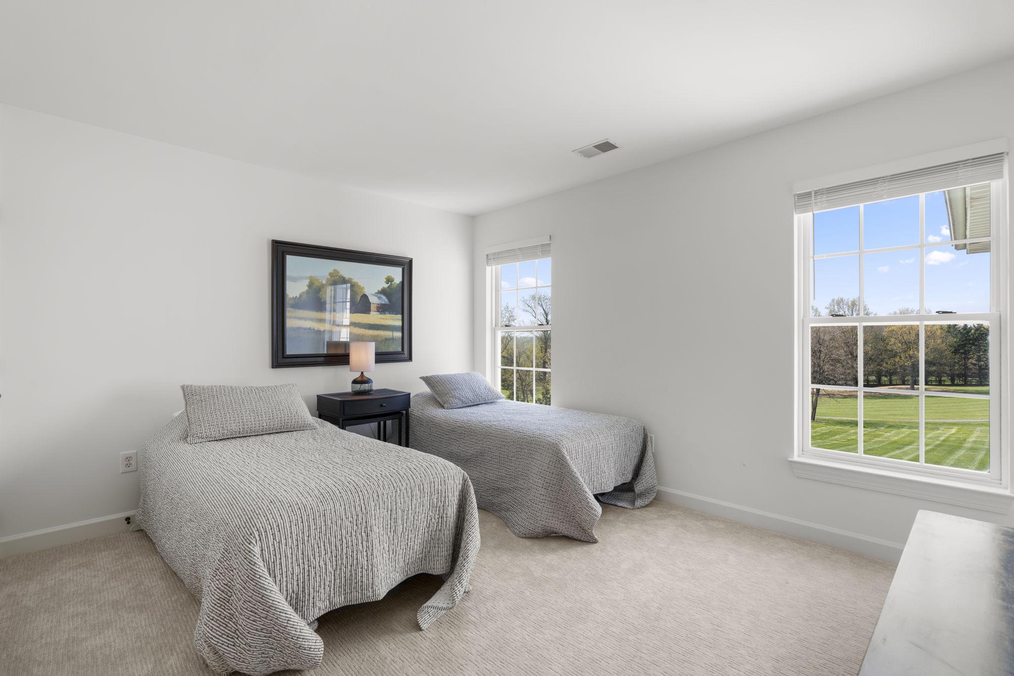 3088 Ballesteras Court Mount Airy, MD 21771 - Photo 40 of 64 a bedroom with two beds and a window