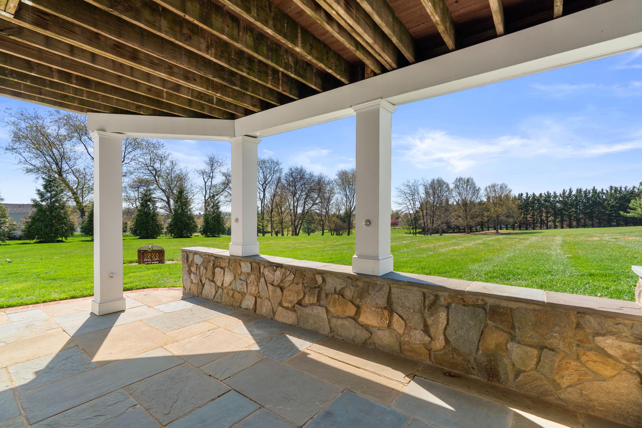 3088 Ballesteras Court Mount Airy, MD 21771 - Photo 55 of 64 a view of swimming pool with garden and trees in the background