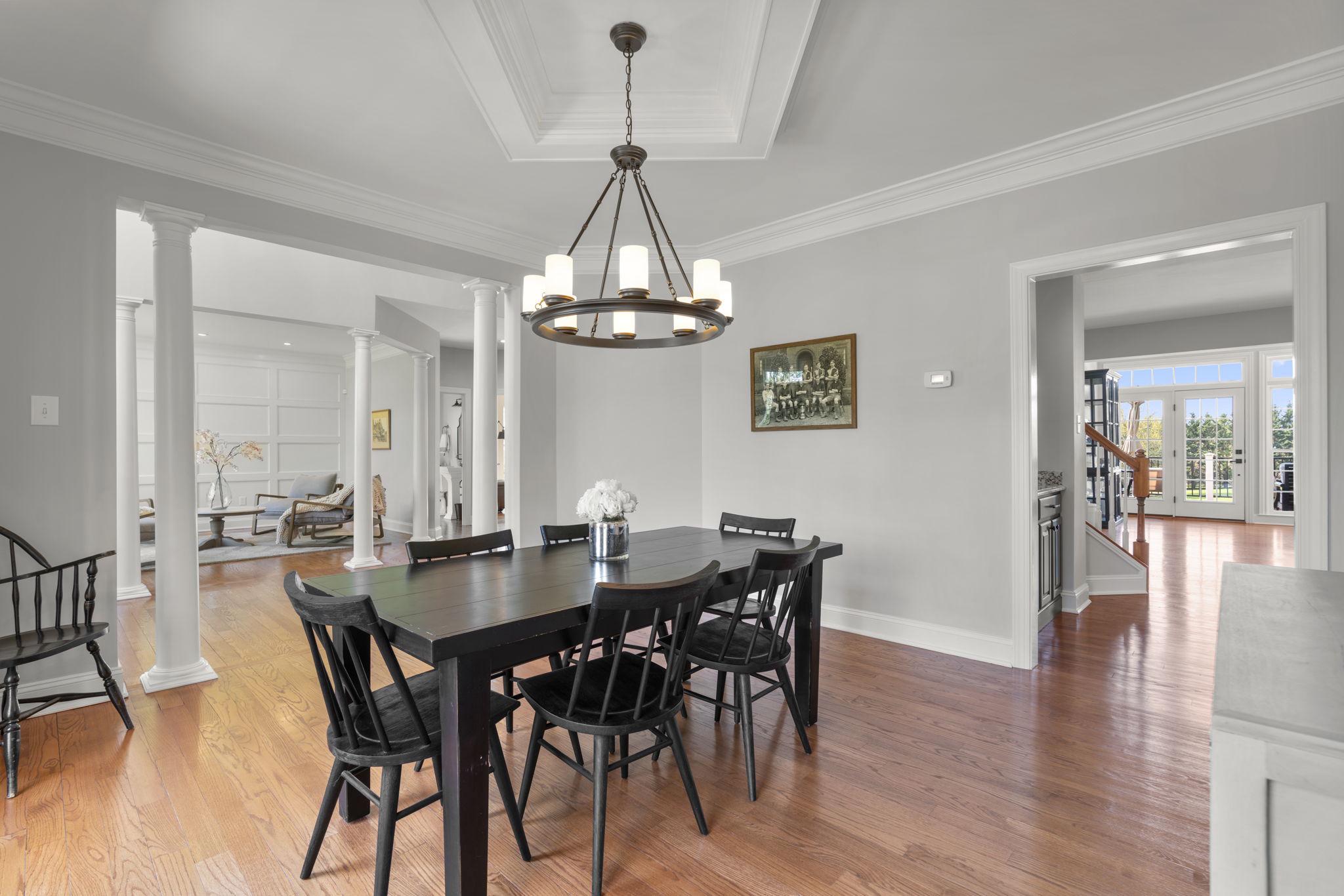 3088 Ballesteras Court Mount Airy, MD 21771 - Photo 6 of 64 a view of a dining room with furniture and wooden floor