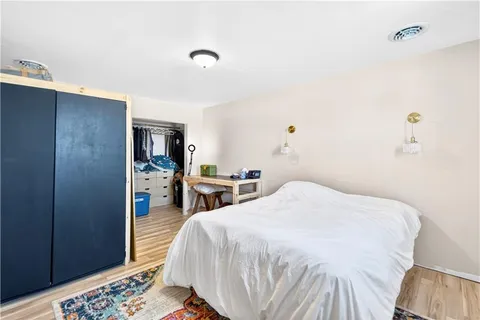 a view of a city with lawn chairs