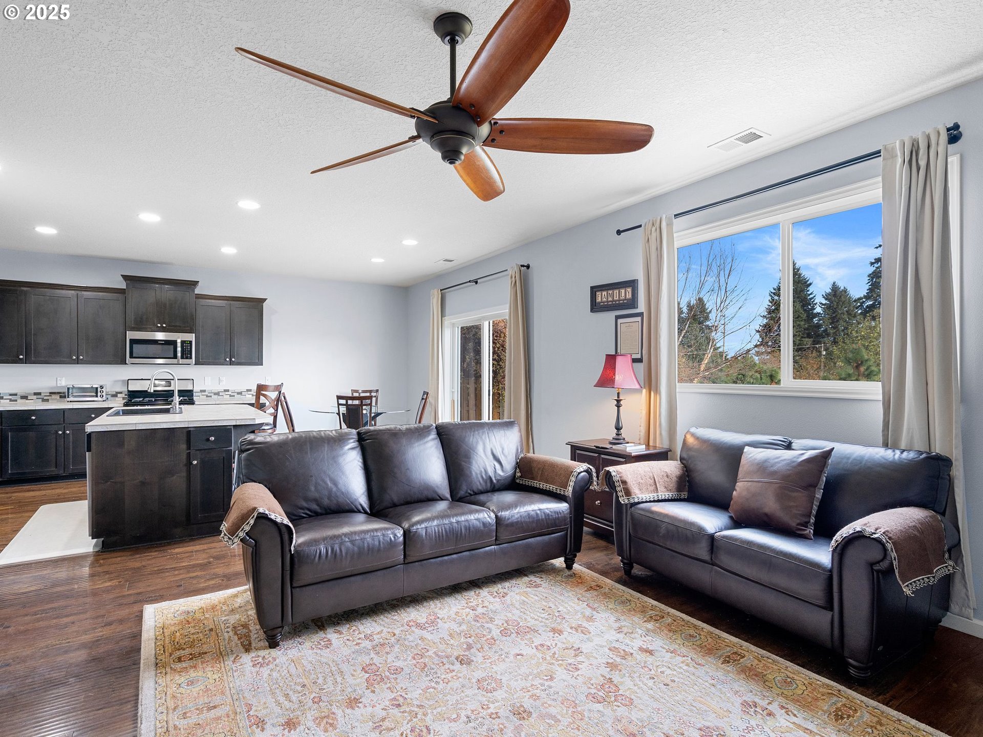 51350 Southwest Randstad Street Scappoose, OR 97056 - Photo 12 of 43 a living room with furniture and a large window