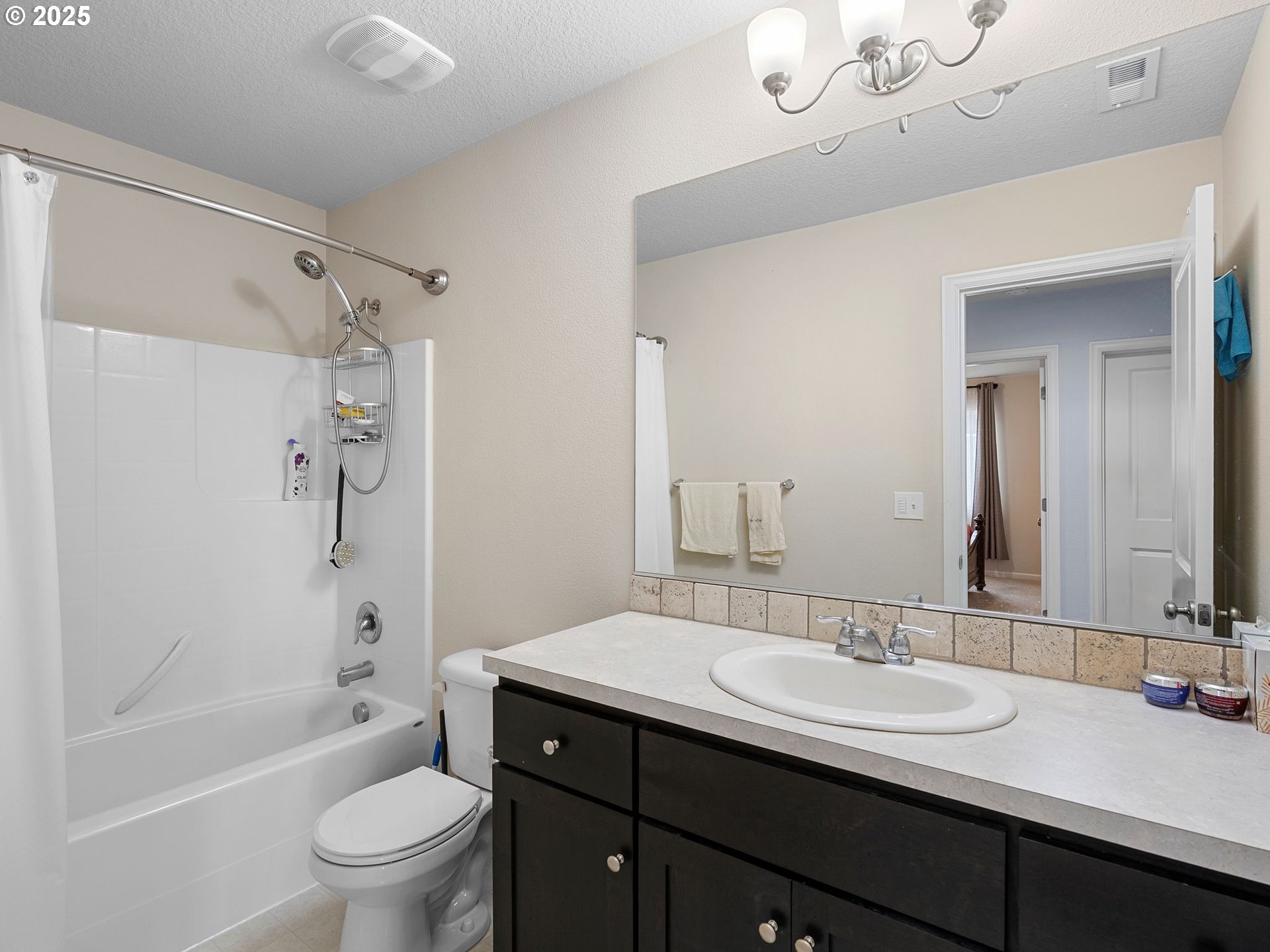51350 Southwest Randstad Street Scappoose, OR 97056 - Photo 22 of 43 a bathroom with a sink a toilet and shower