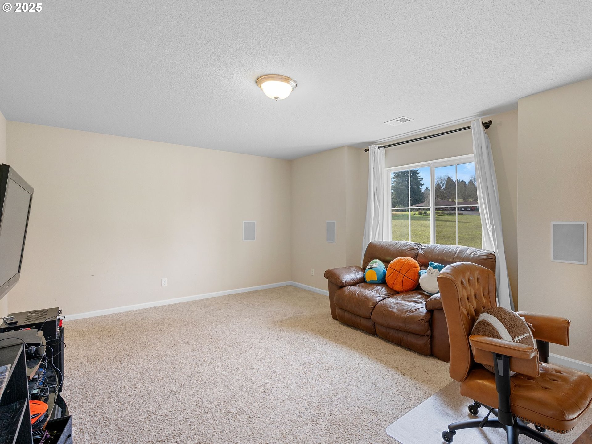 51350 Southwest Randstad Street Scappoose, OR 97056 - Photo 26 of 43 a living room with furniture and a window