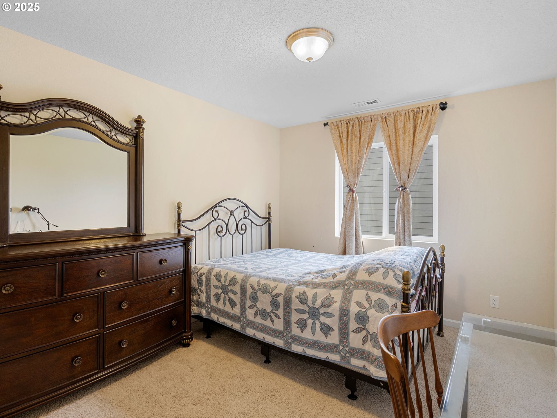 51350 Southwest Randstad Street Scappoose, OR 97056 - Photo 28 of 43 a bedroom with a bed and a window