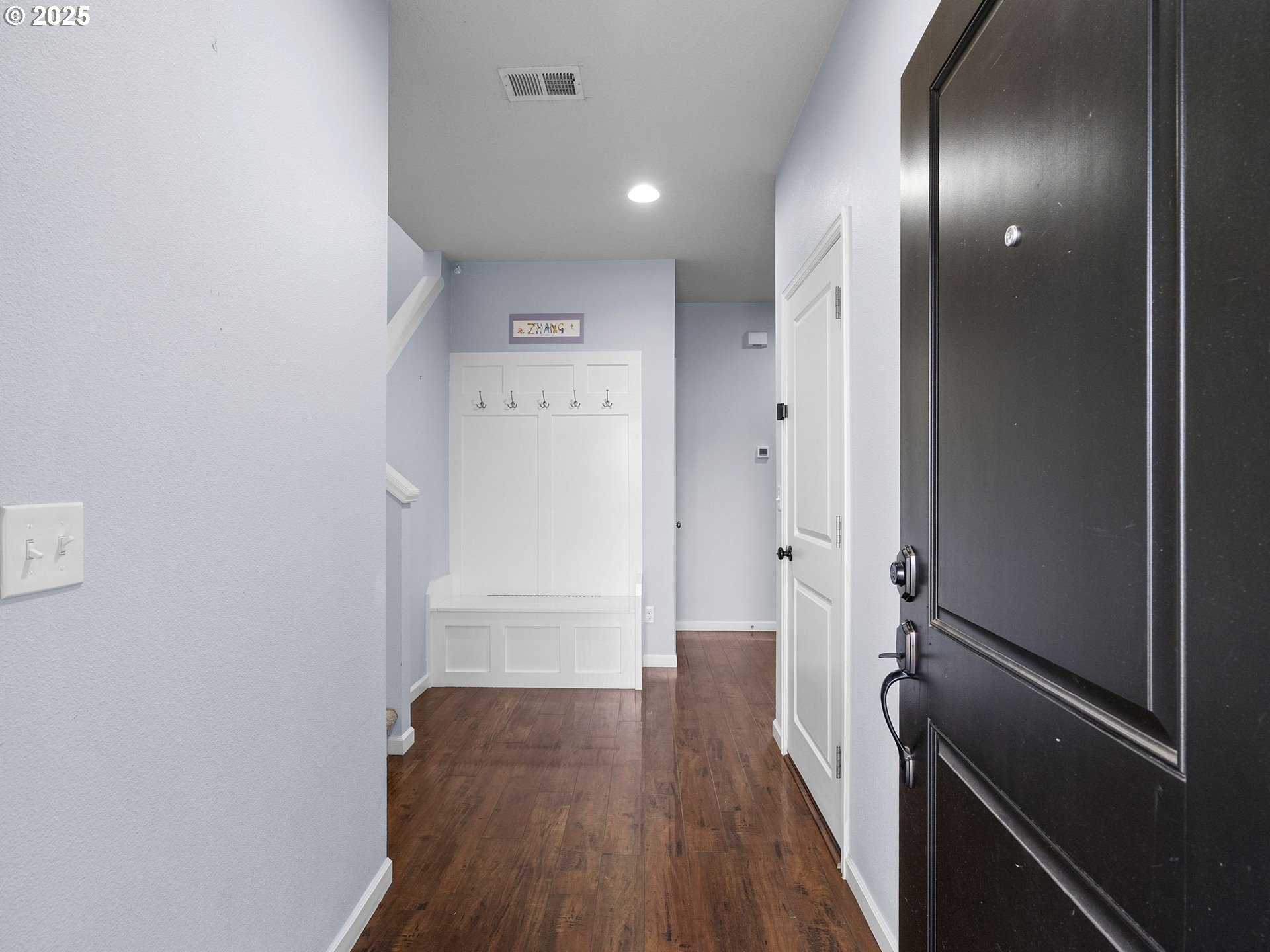 51350 Southwest Randstad Street Scappoose, OR 97056 - Photo 4 of 43 a view of a hallway with wooden floor