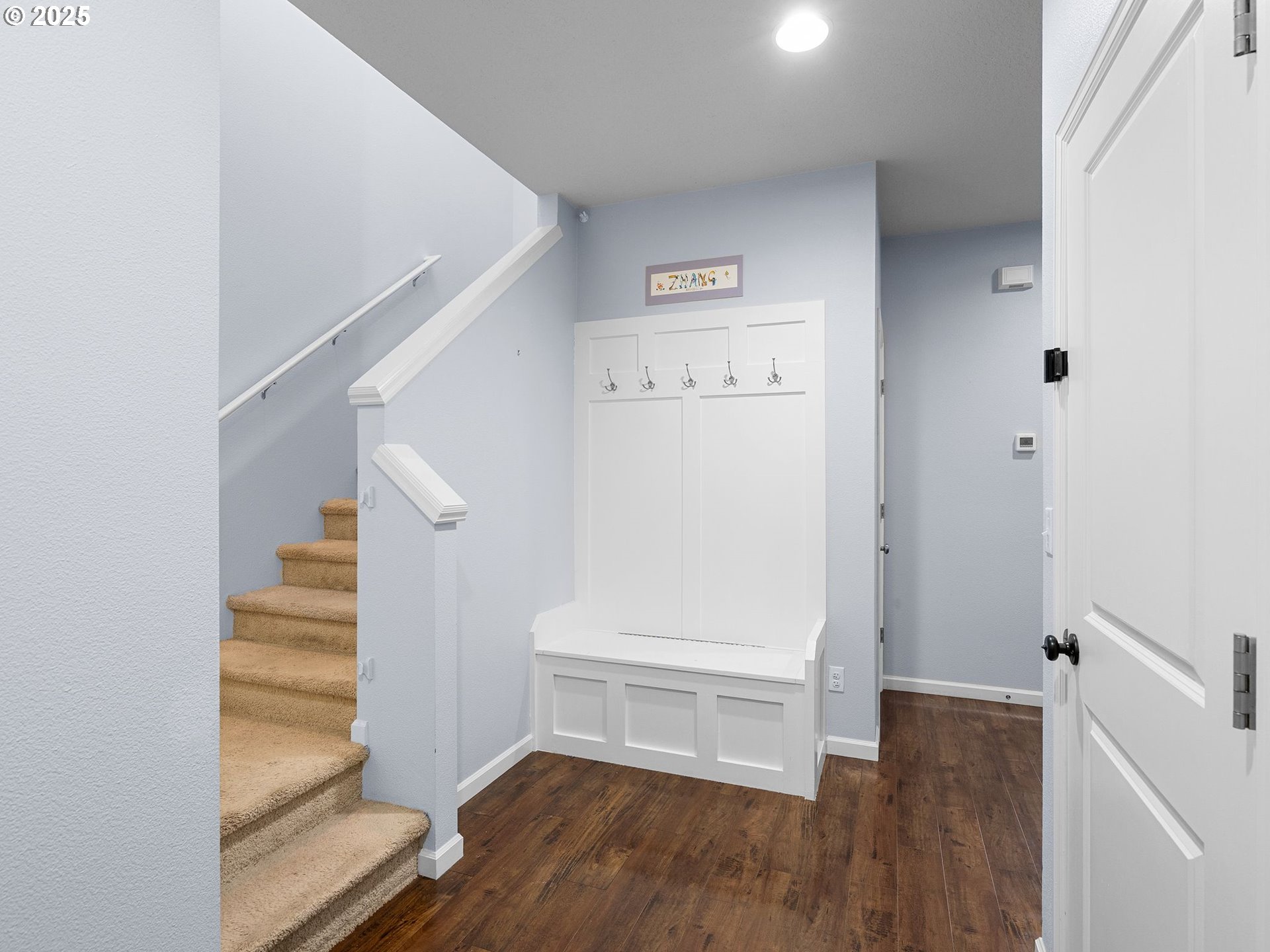 51350 Southwest Randstad Street Scappoose, OR 97056 - Photo 5 of 43 a view of entryway with stairs and wooden floor