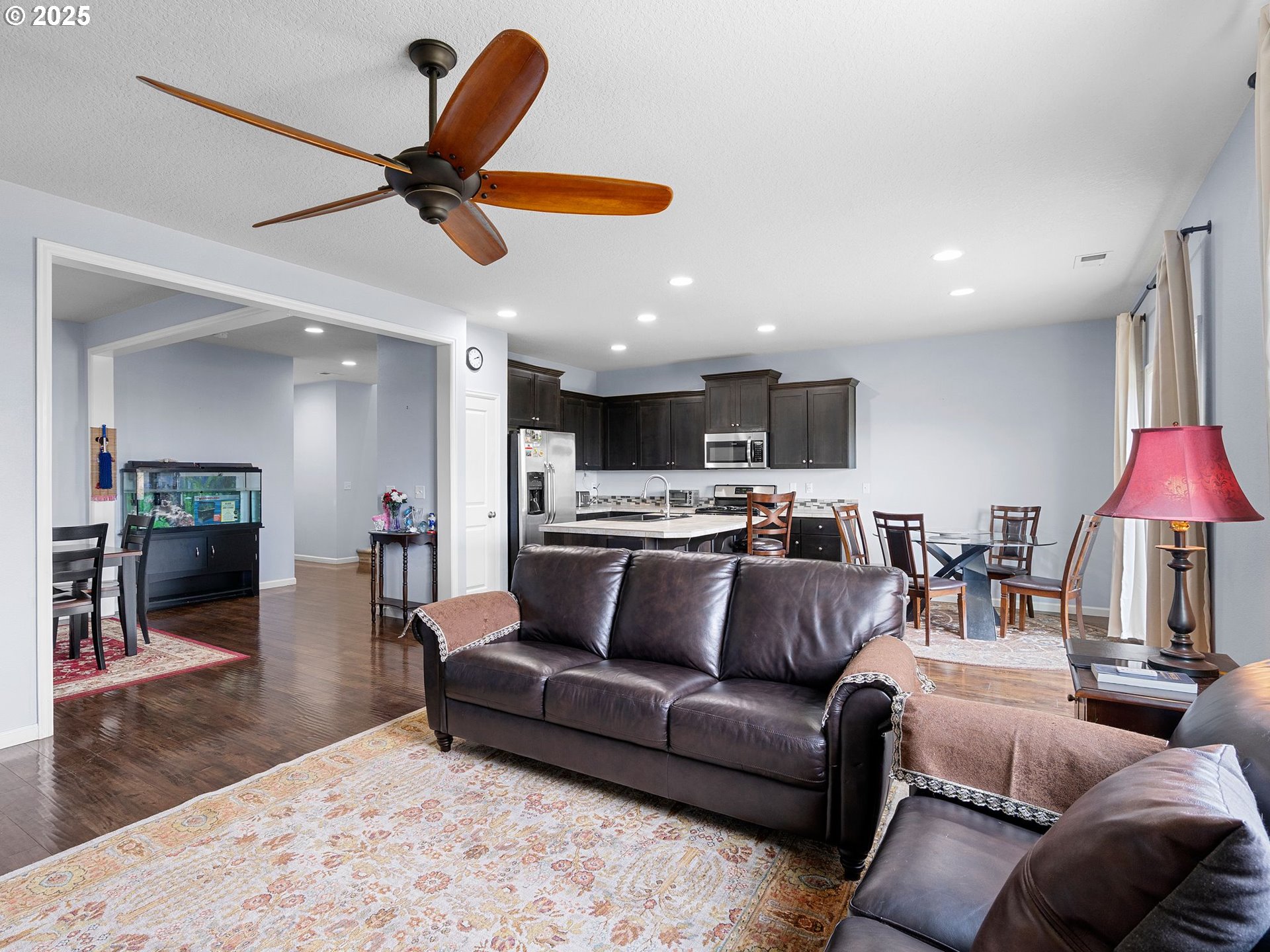 51350 Southwest Randstad Street Scappoose, OR 97056 - Photo 10 of 43 a living room with furniture and kitchen view