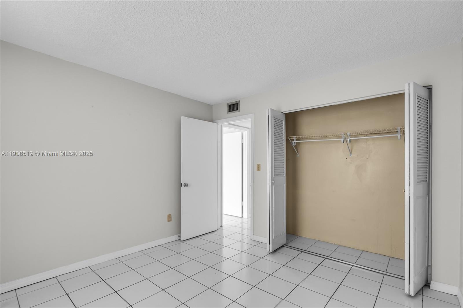 7345 West 4th Avenue, Unit 402 Hialeah, FL 33014 - Photo 13 of 22 a view of an empty room