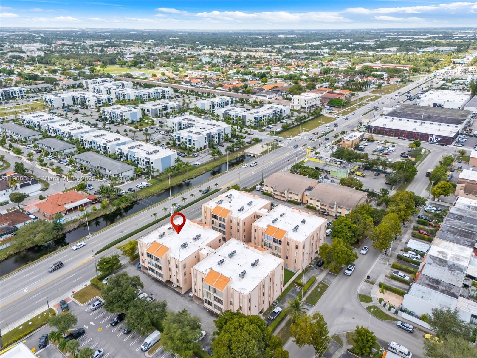 7345 West 4th Avenue, Unit 402 Hialeah, FL 33014 - Photo 20 of 22 an aerial view of residential houses with outdoor space
