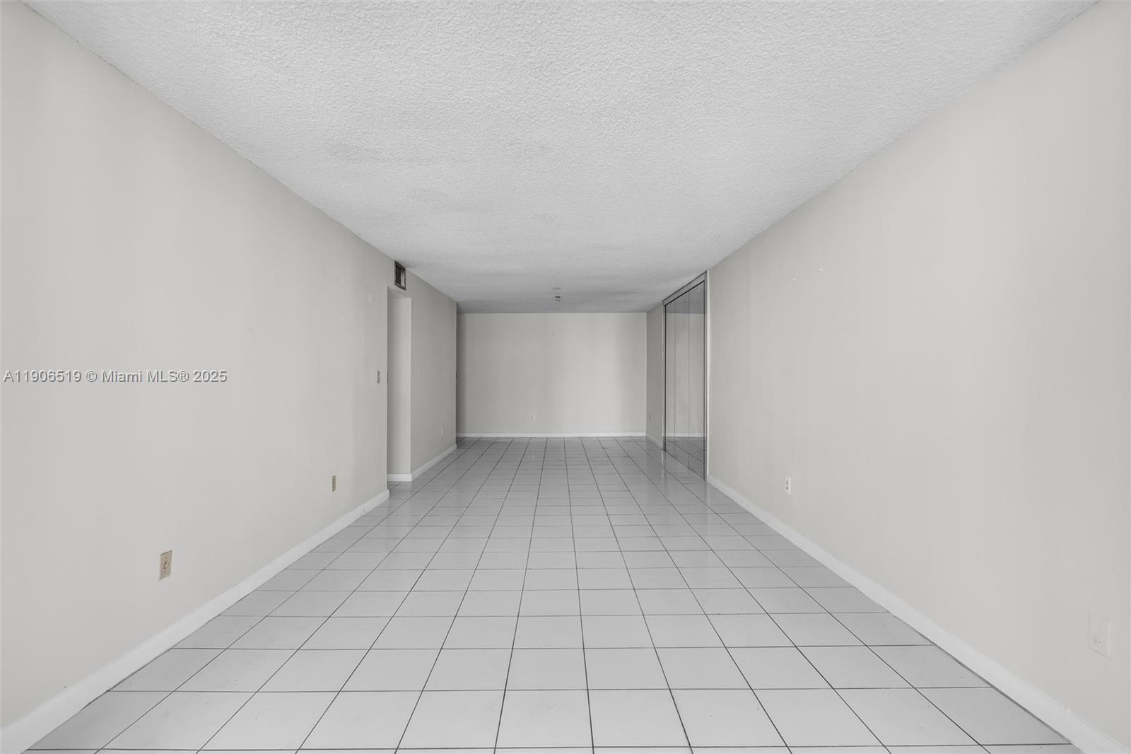 7345 West 4th Avenue, Unit 402 Hialeah, FL 33014 - Photo 4 of 22 a view of an empty room
