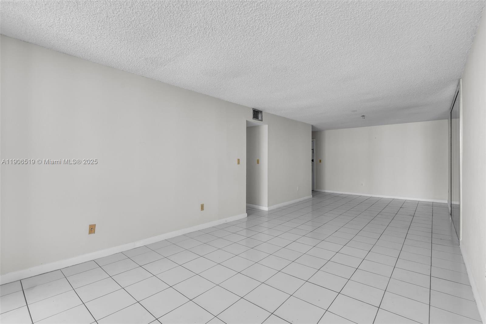 7345 West 4th Avenue, Unit 402 Hialeah, FL 33014 - Photo 6 of 22 a view of an empty room