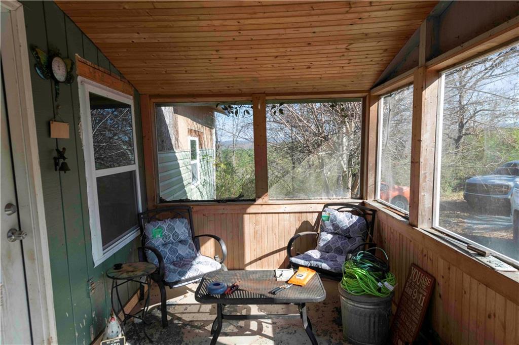 946 Hightower Loop Road Ranger, GA 30734 - Photo 16 of 22 a living room filled with furniture