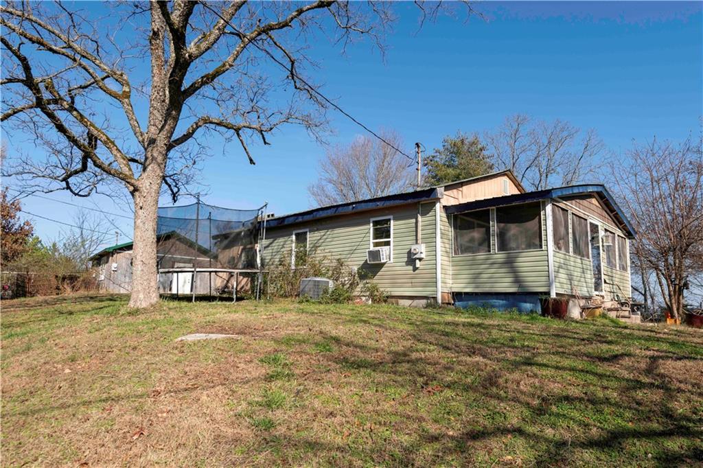 946 Hightower Loop Road Ranger, GA 30734 - Photo 7 of 22 a view of a house with a yard
