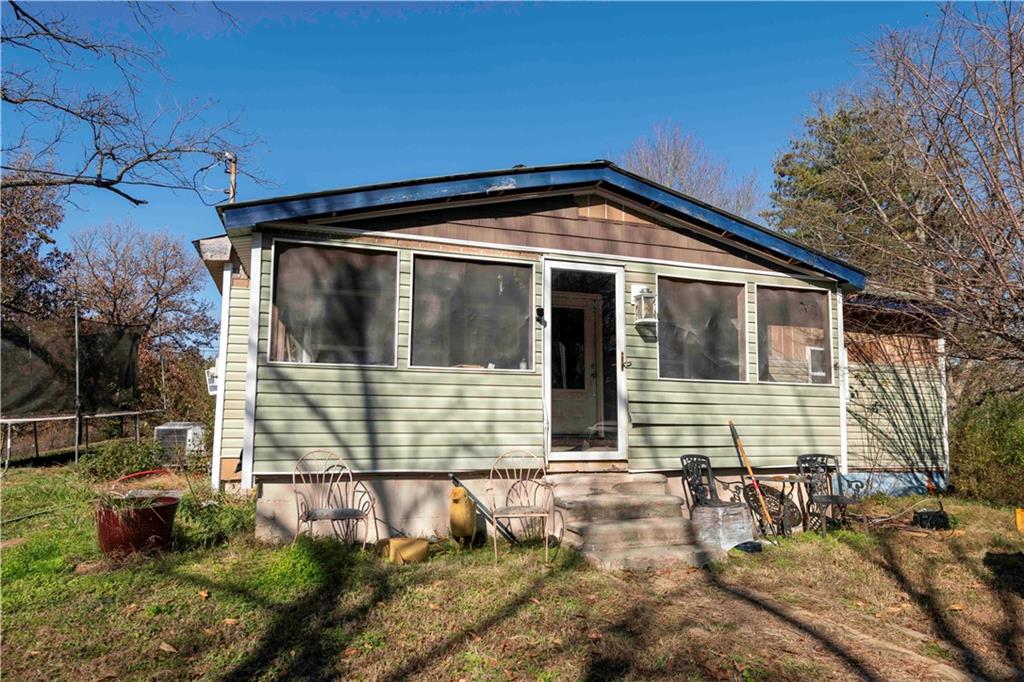 946 Hightower Loop Road Ranger, GA 30734 - Photo 8 of 22 a view of a house with a yard