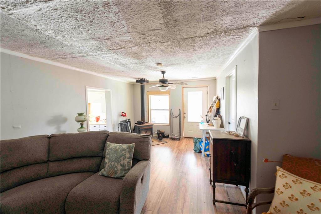 946 Hightower Loop Road Ranger, GA 30734 - Photo 9 of 22 a living room with furniture and wooden floor