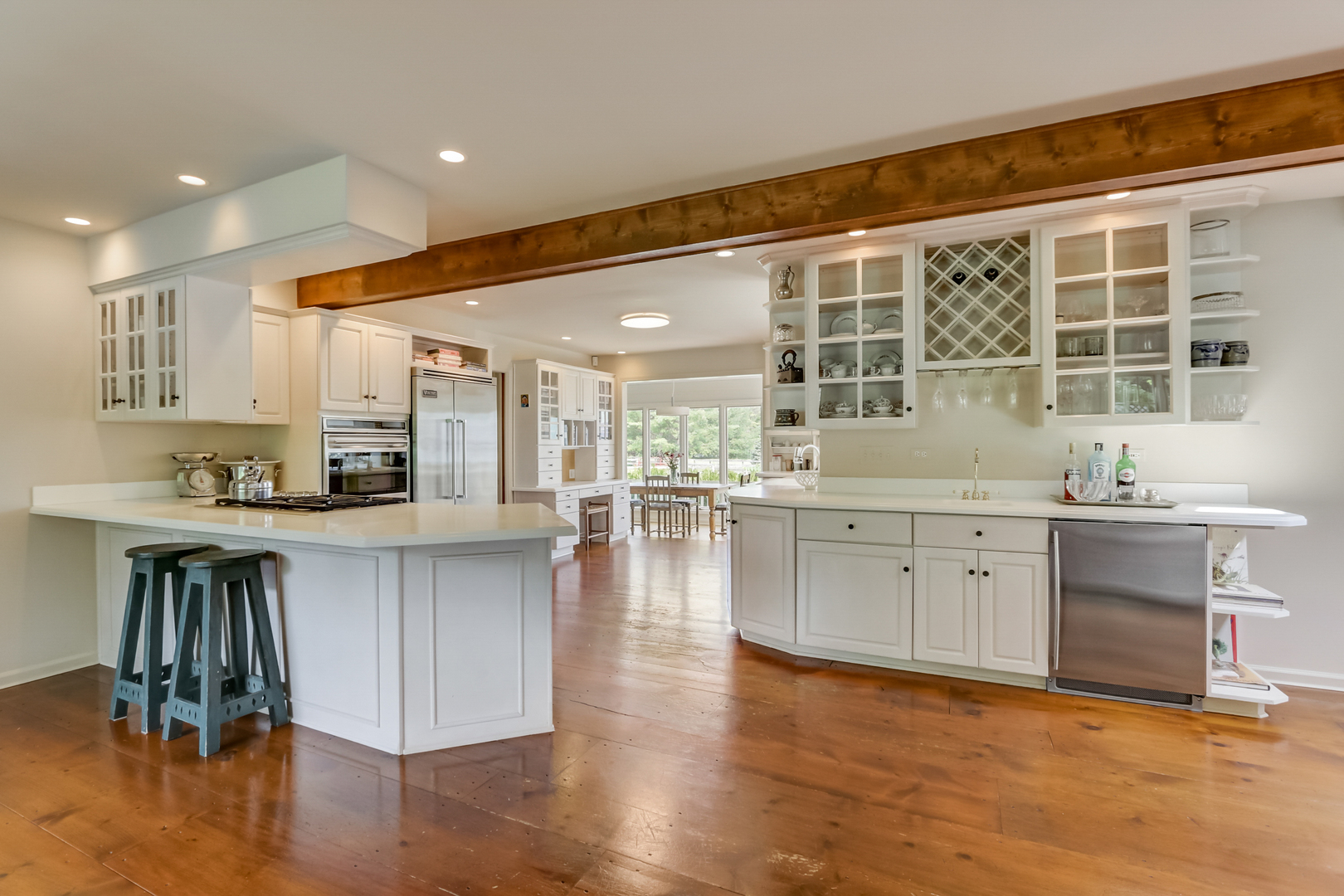 22154 North Harbor Road Barrington, IL 60010 - Photo 11 of 61 a kitchen with stainless steel appliances granite countertop a stove and a sink