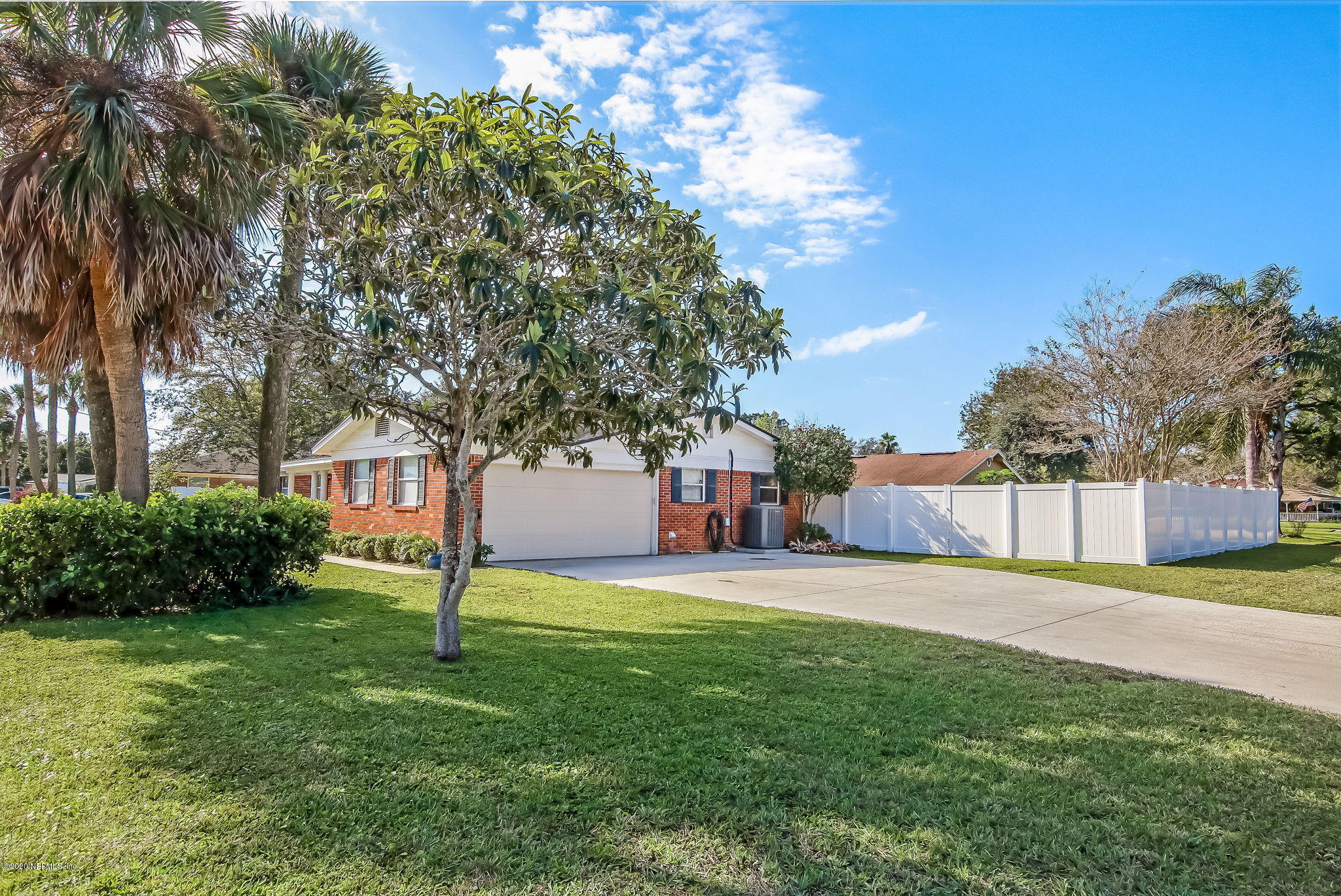 4006 Eunice Road Jacksonville, FL 32250 - Photo 4 of 30 a view of a house with a yard and pathway