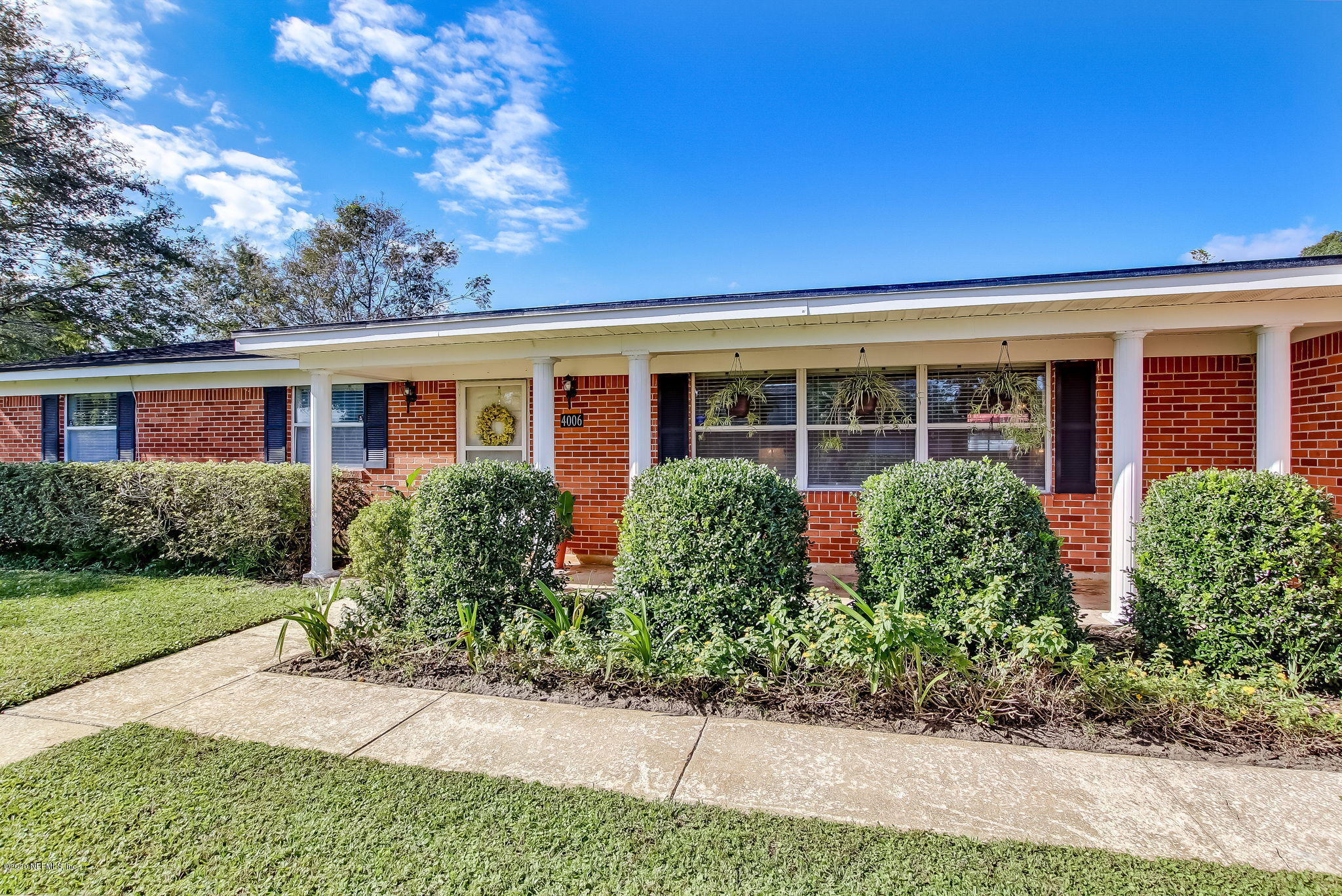 4006 Eunice Road Jacksonville, FL 32250 - Photo 5 of 30 front view of a house with a yard