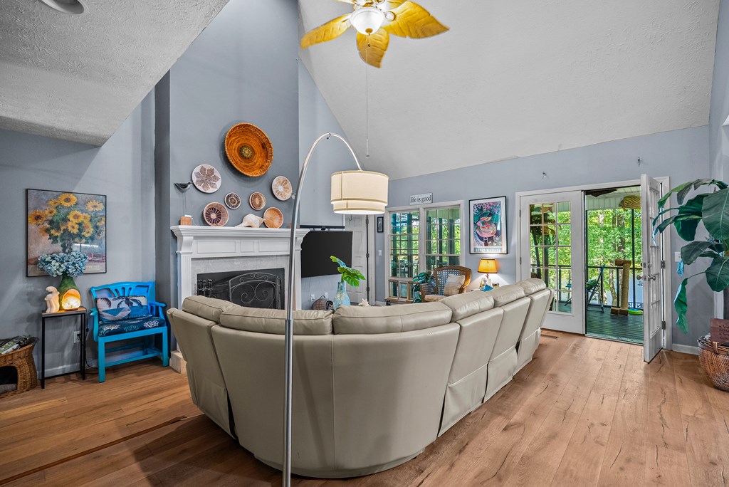 235 Epps Road Box Springs, GA 31801 - Photo 21 of 93 a living room with furniture and a fireplace