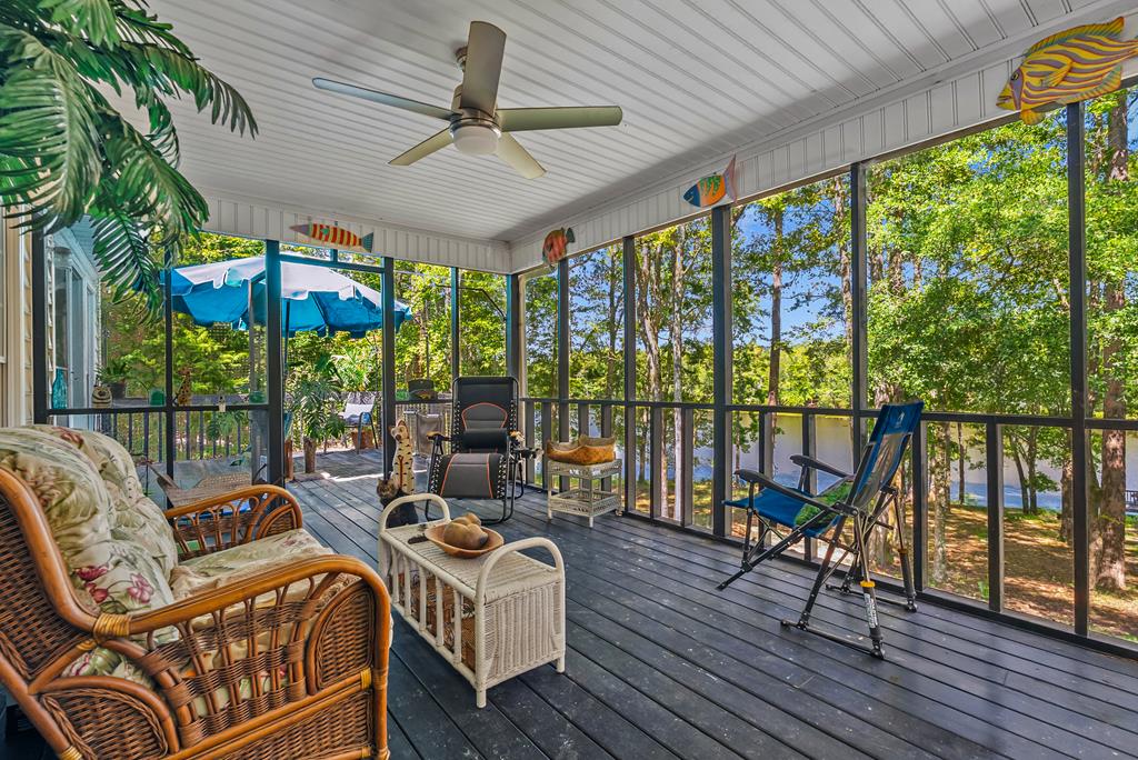 235 Epps Road Box Springs, GA 31801 - Photo 29 of 93 a balcony with furniture and wooden floor