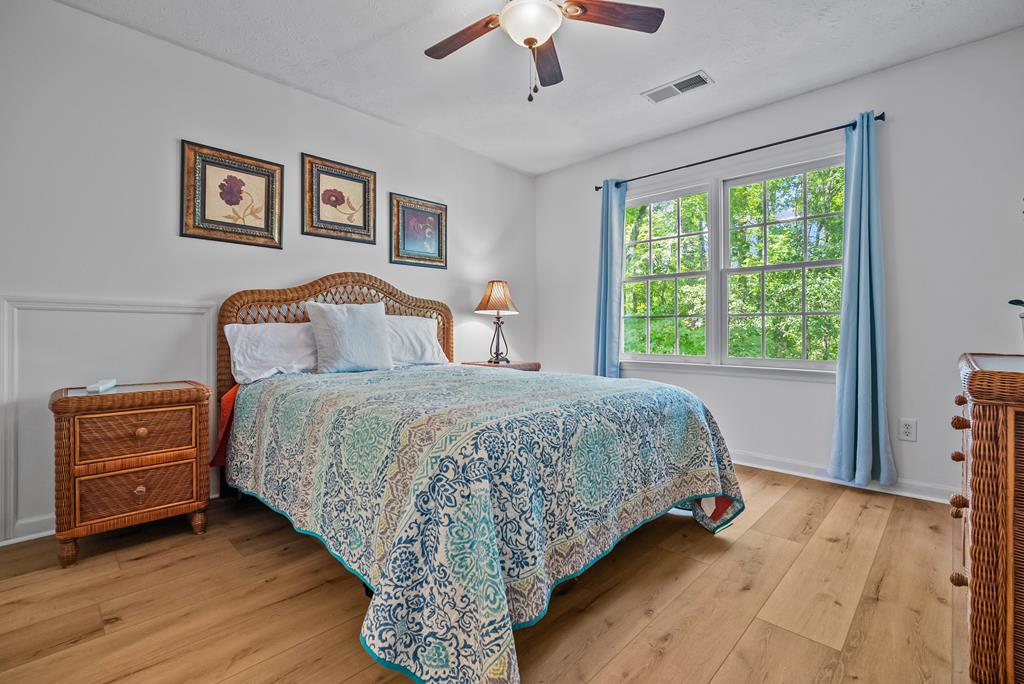 235 Epps Road Box Springs, GA 31801 - Photo 36 of 93 a bedroom with a large bed and a window