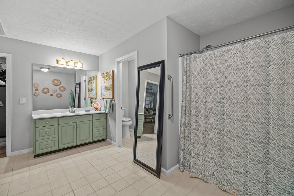 235 Epps Road Box Springs, GA 31801 - Photo 50 of 93 a room with a mirror and a walk in closet