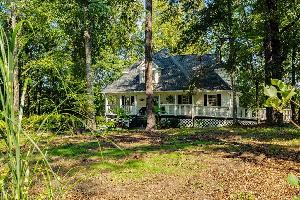 235 Epps Road Box Springs, GA 31801 - Photo 58 of 93 a front view of a house with a yard