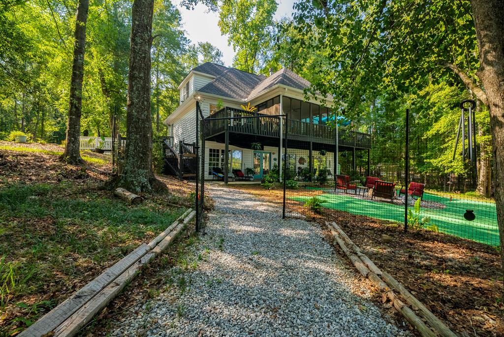 235 Epps Road Box Springs, GA 31801 - Photo 65 of 93 a view of a house with backyard and porch