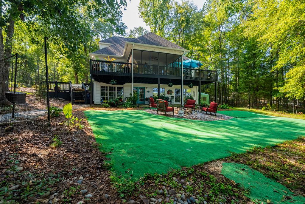 235 Epps Road Box Springs, GA 31801 - Photo 66 of 93 a view of a chair and table in the garden