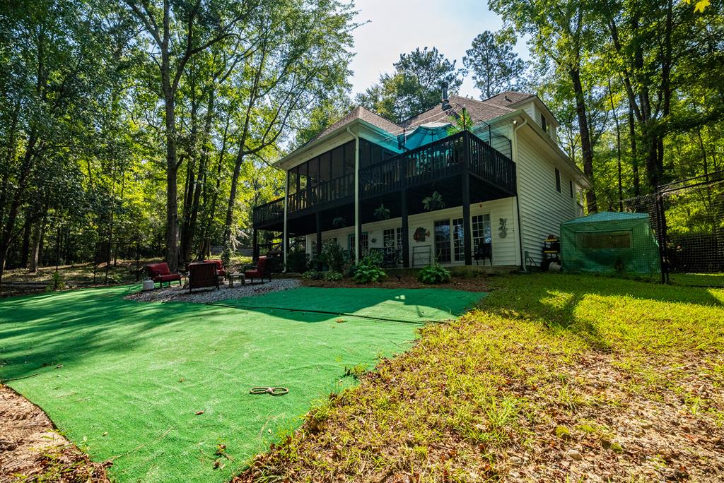 235 Epps Road Box Springs, GA 31801 - Photo 68 of 93 a view of a house with backyard and sitting area