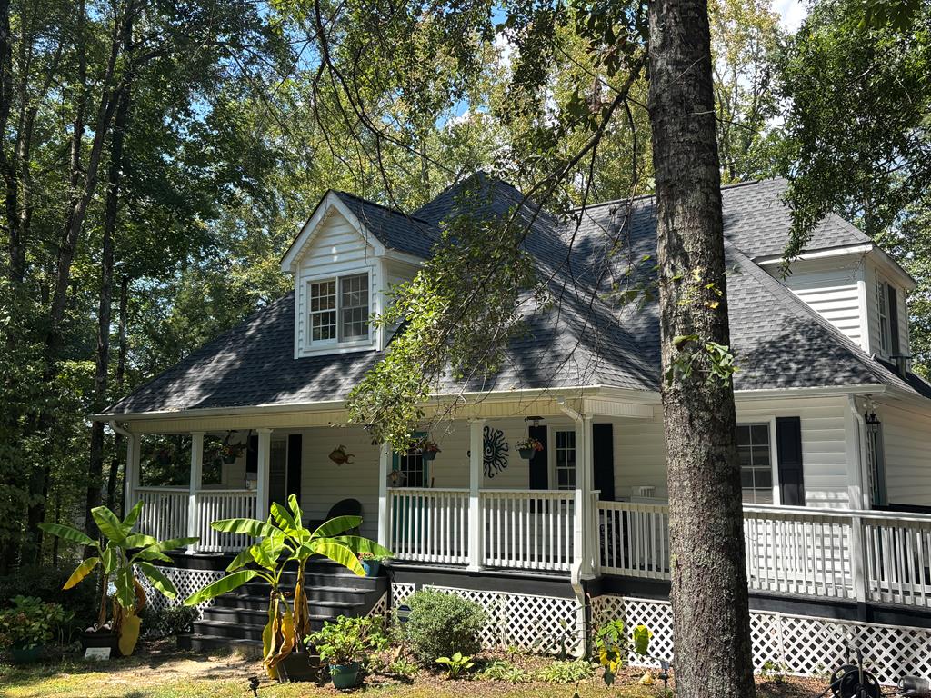 235 Epps Road Box Springs, GA 31801 - Photo 88 of 93 a front view of a house with a garden