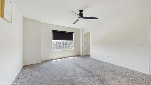 a bathroom with a shower sink and mirror