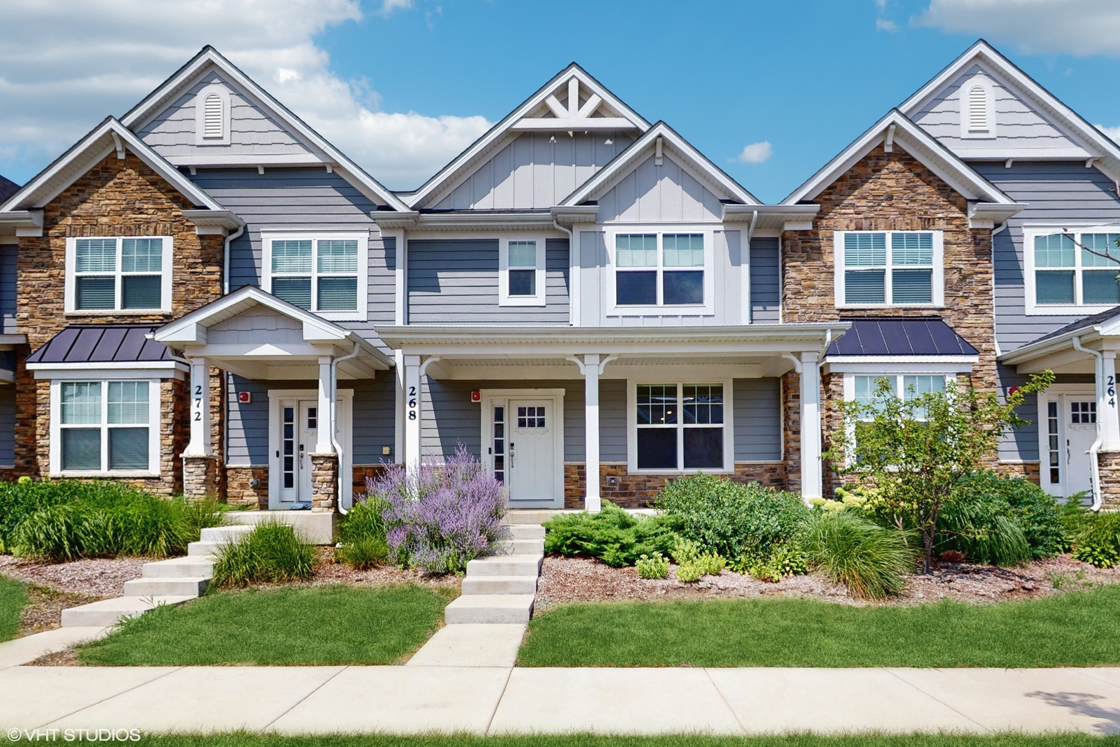 268 Hoffmann Drive, Unit 268 Buffalo Grove, IL 60089 - Photo 2 of 37 front view of a house with a yard