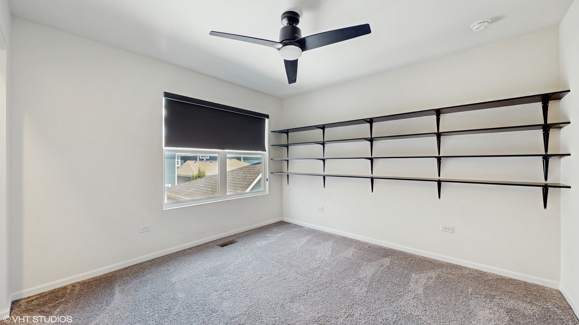 268 Hoffmann Drive, Unit 268 Buffalo Grove, IL 60089 - Photo 23 of 37 a view of a room with air conditioner and window
