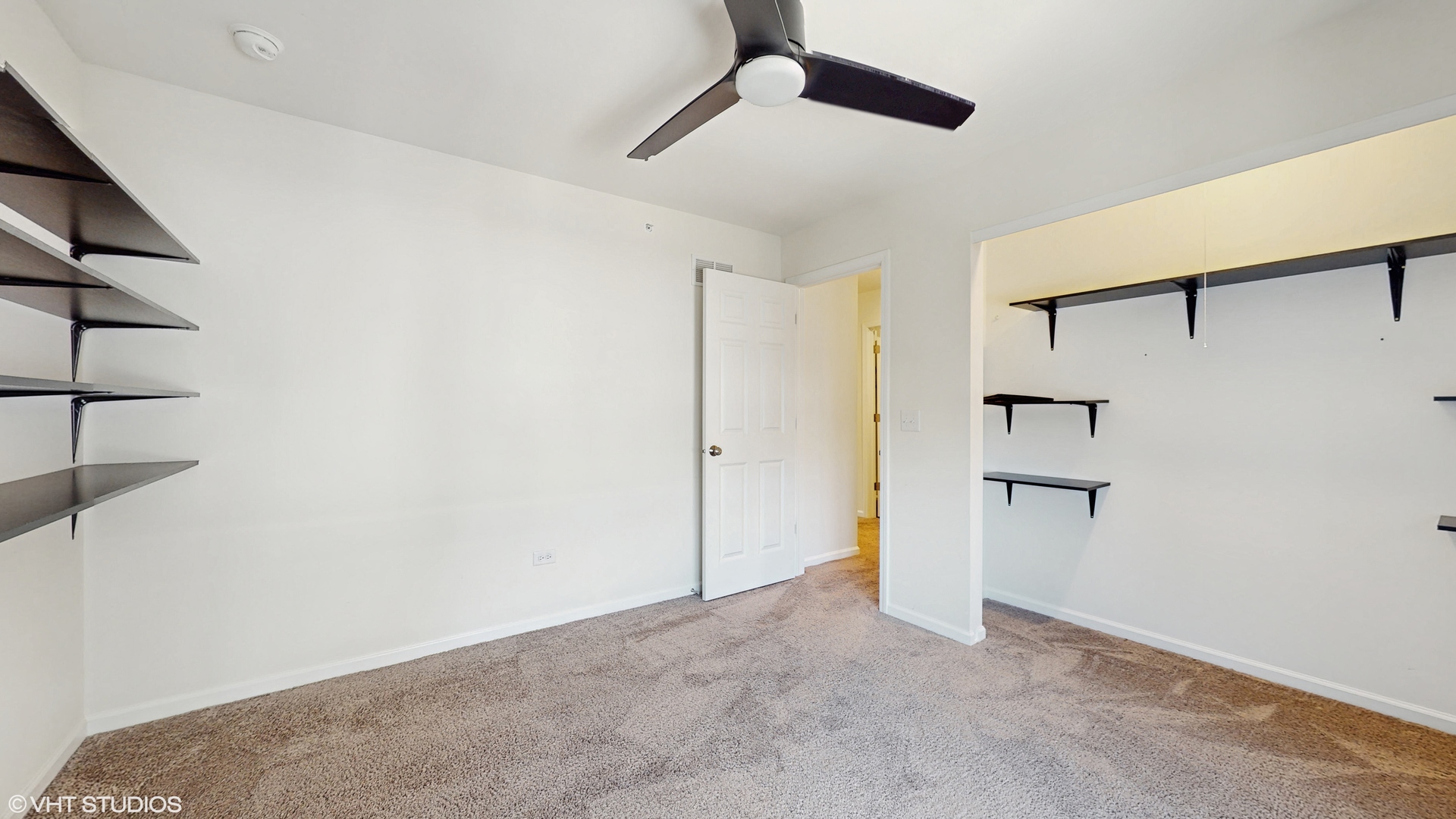 268 Hoffmann Drive, Unit 268 Buffalo Grove, IL 60089 - Photo 24 of 37 a view of a big room with closet and racks