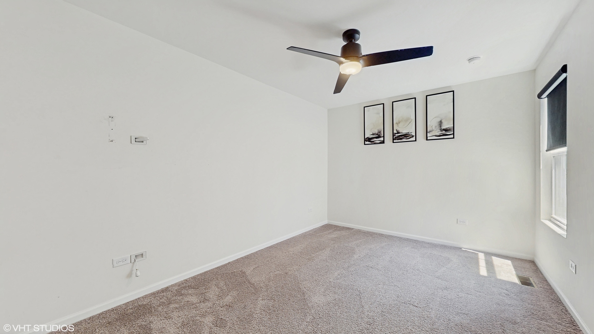 268 Hoffmann Drive, Unit 268 Buffalo Grove, IL 60089 - Photo 27 of 37 a view of a livingroom with a ceiling fan