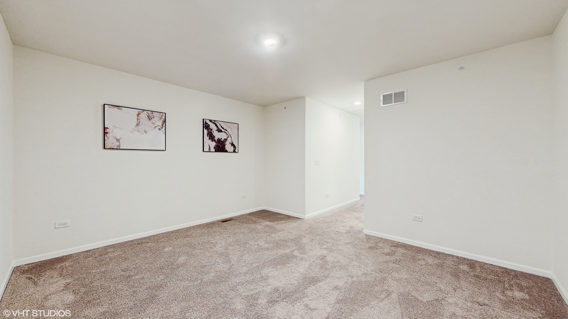 268 Hoffmann Drive, Unit 268 Buffalo Grove, IL 60089 - Photo 28 of 37 an empty room with a painting on the wall