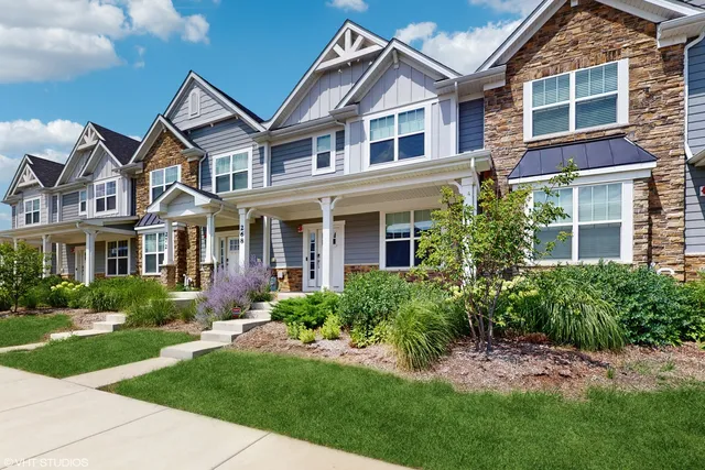 front view of a house with a yard